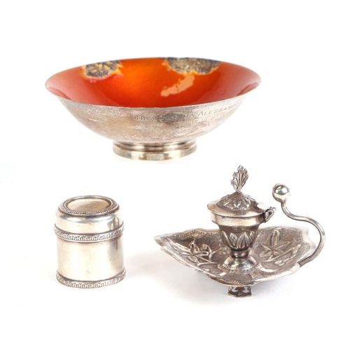 653 - An Indian white metal chamberstick; together with a sterling silver and enamel footed bowl; and a si... 