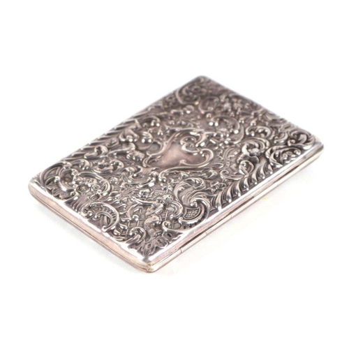 655 - A late Victorian silver necessaire with scrolling foliate decoration, the kid leather fitted interio... 