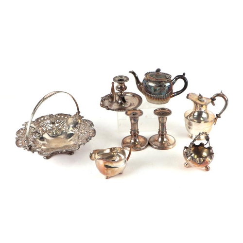 665 - A quantity of silverplated items to include teapots, telescopic candlesticks, swing handled basket a... 