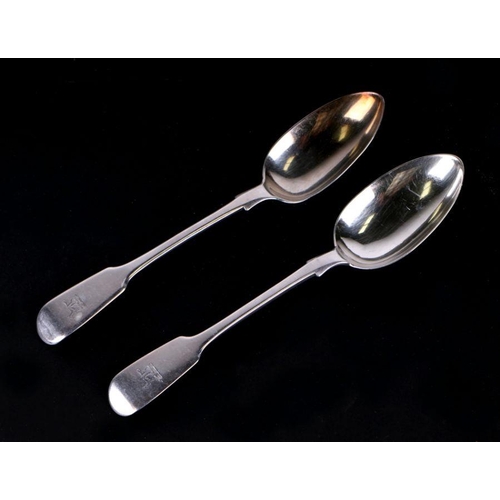 674 - A matched pair of early Victorian silver fiddle pattern tablespoons, London 1847 and 1855, with armo... 