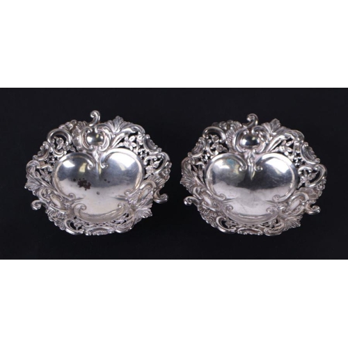 687 - A pair of Victorian pierced silver bonbon dishes, London 1895, 9.5cm wide, 92g (2).