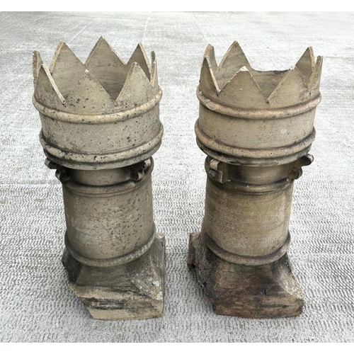 7 - A pair of crown top earthenware chimney pots, each 80cm high (2).