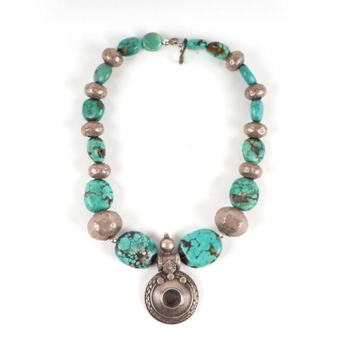 723 - A white metal and turquoise Navajo style necklace.