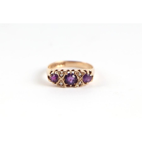 739 - A 9ct gold three stone amethyst and seed pearl half hoop ring, approx UK size 'M', 2g.