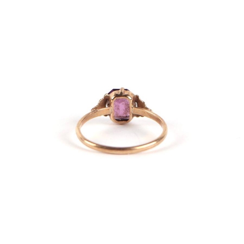 744 - A 9ct gold and amethyst solitaire ring, approx UK size 'P', 1g.