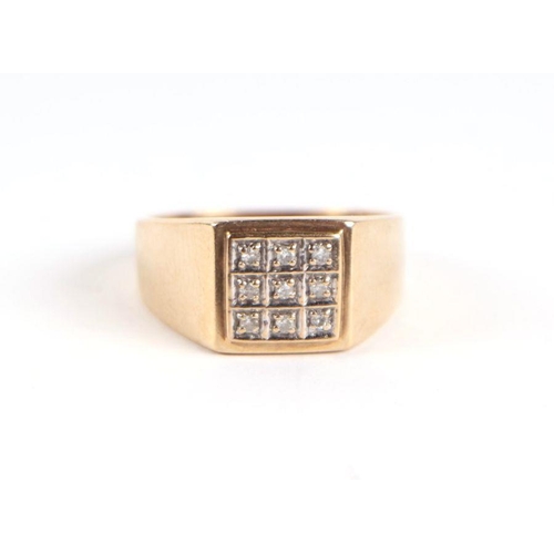 746 - A 9ct gold and diamond gentleman's signet ring, approx UK size 'N', 4g.