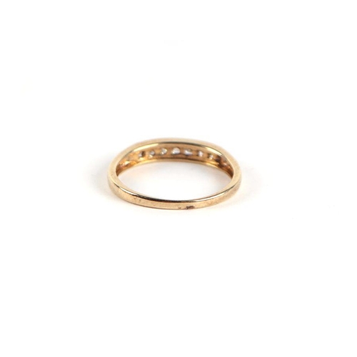 748 - A 9ct gold and diamond half hoop ring, approx UK size 'N', 2g.