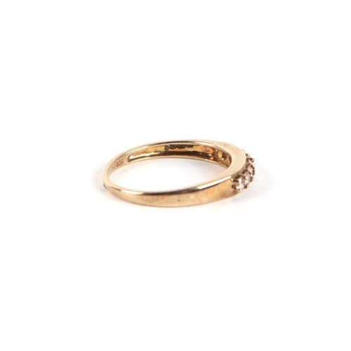 748 - A 9ct gold and diamond half hoop ring, approx UK size 'N', 2g.