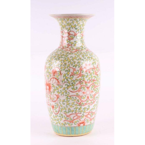 756 - A Chinese baluster vase decorated with scrolling foliage, red character mark to base, 45cm high.