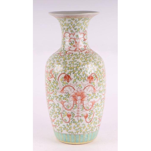 756 - A Chinese baluster vase decorated with scrolling foliage, red character mark to base, 45cm high.