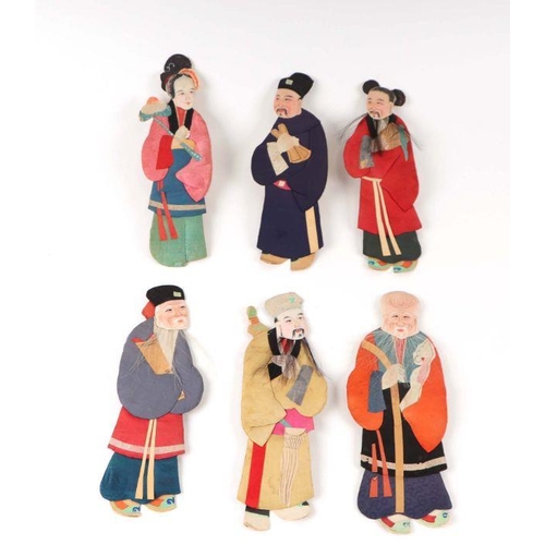 778 - A group of Chinese padded textile figures mounted on card with hand painted faces. Each approx. 28cm... 