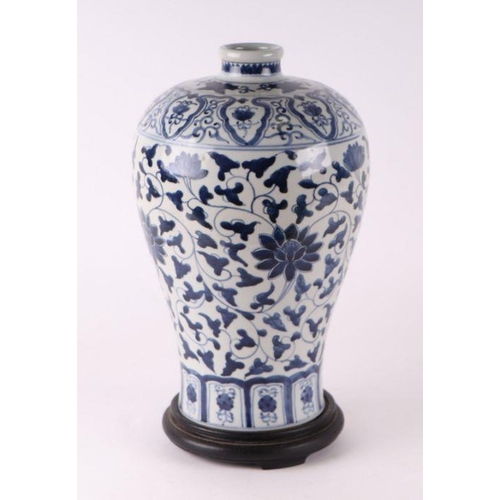 779 - A Chinese blue and white meiping vase, decorated scrolling foliage with six character blue mark to t... 