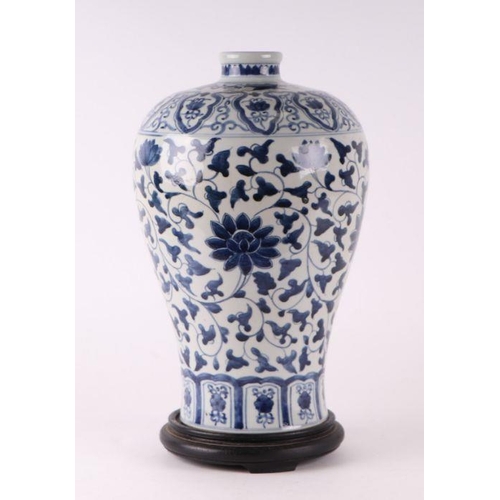 779 - A Chinese blue and white meiping vase, decorated scrolling foliage with six character blue mark to t... 