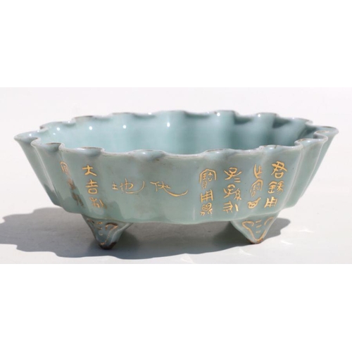 785 - A Chinese pale celadon glaze oval footed planter with wavy rim, gilt decoration and calligraphy, 21c... 