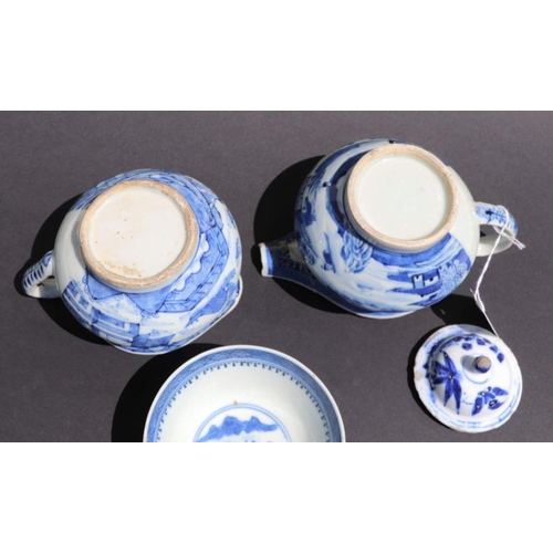 792 - A pair of Chinese blue & white shallow dishes decorated with a pagoda, 15cms diameter; together ... 