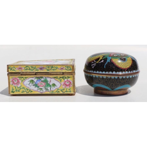 793 - A Chinese enamel rectangular box decorated with flowers on a yellow ground, 10cms wide; together wit... 