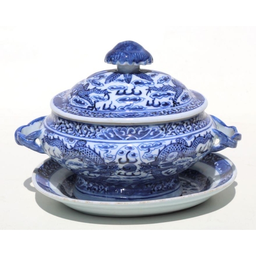 800 - A Chinese blue & white two-handled tureen on stand of small proportions, decorated with dragons chas... 