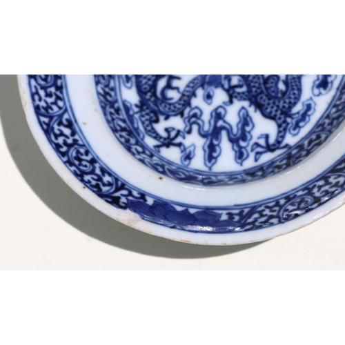 800 - A Chinese blue & white two-handled tureen on stand of small proportions, decorated with dragons chas... 