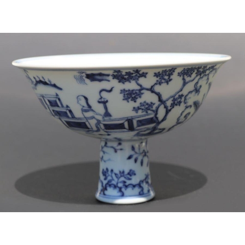 807 - A Chinese blue and white stem cup decorated with figures within a garden scene, 17cm diameter