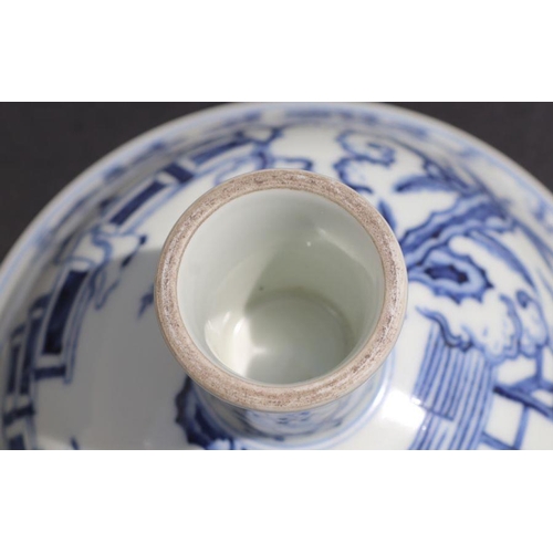 807 - A Chinese blue and white stem cup decorated with figures within a garden scene, 17cm diameter