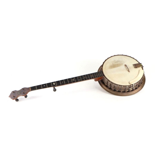 81 - A John Grey & Sons (London) five-string banjo, with mother of pearl inlay and unusual Indian sty... 