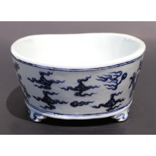 813 - A Chinese blue and white planter, decorated dragon chasing flaming pearl, six character mark to base... 