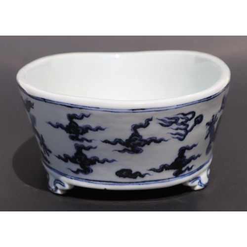 813 - A Chinese blue and white planter, decorated dragon chasing flaming pearl, six character mark to base... 