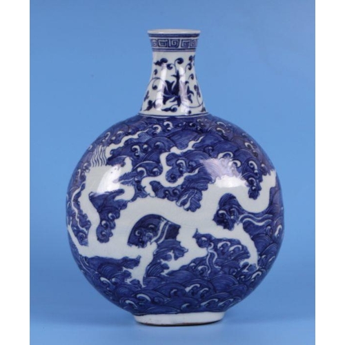 814 - A Chinese blue & white vase decorated with dragons amongst waves, four character mark to side, 2... 