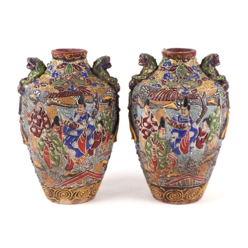 836 - A pair of late 19th century Japanese Satsuma vases decorated with figures in a landscape, 30cm high;... 