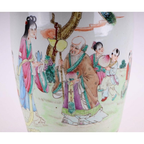 838 - A Chinese republic style vase of baluster form decorated with figures within a landscape, 62cm high.