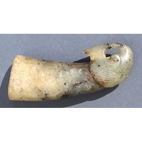 856 - A Chinese soapstone carving in the form of a rhino horn libation cup, 9cm high.