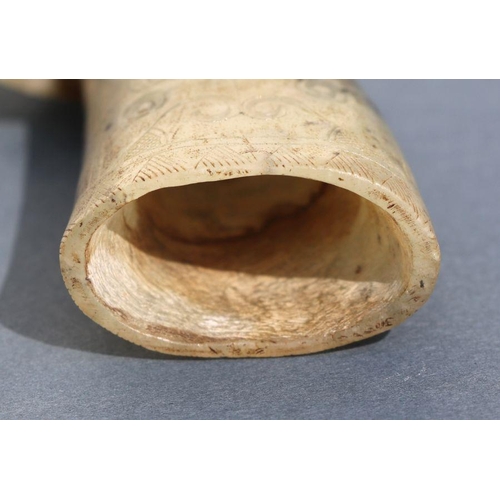 856 - A Chinese soapstone carving in the form of a rhino horn libation cup, 9cm high.