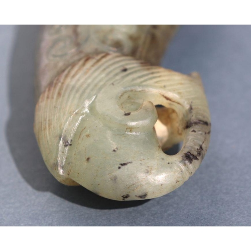 856 - A Chinese soapstone carving in the form of a rhino horn libation cup, 9cm high.