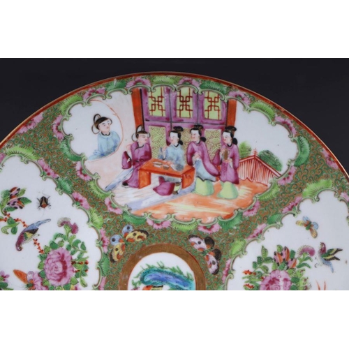 873 - A 19th century Chinese Canton Export famille rose charger decorated with figures, flowers and butter... 