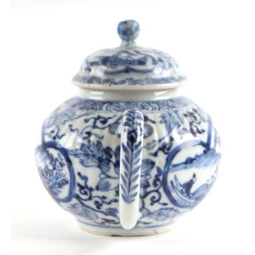 875 - A Chinese blue and white teapot decorated with figures within panels, probably Kangxi, 11cm high. Co... 