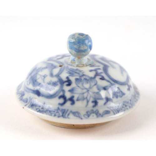 875 - A Chinese blue and white teapot decorated with figures within panels, probably Kangxi, 11cm high. Co... 