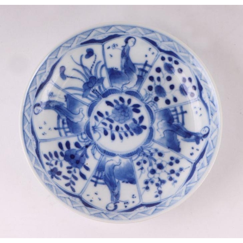 883 - A pair of Chinese blue and white dishes decorated with figures in a garden, four character blue mark... 