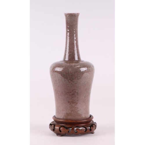 885 - A Chinese mallet form vase with mottled glaze with six character blue mark to the underside, on a ha... 