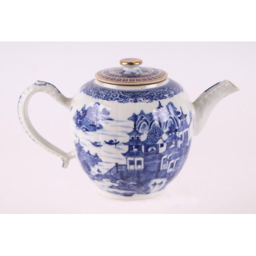 887 - A Chinese blue and white teapot decorated with a river landscape scene, 15cm high.