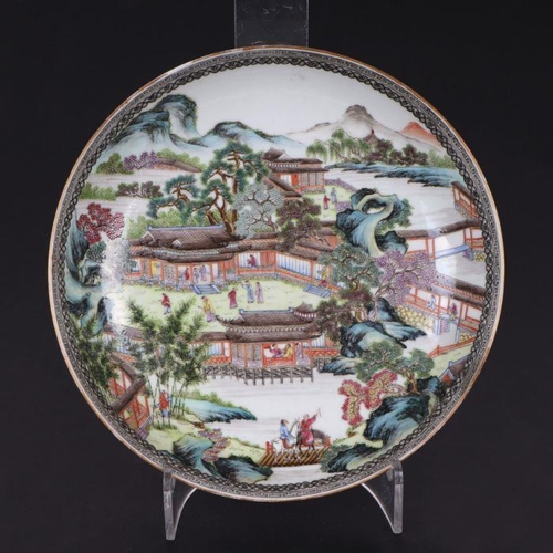 889 - A Chinese Republic footed bowl decorated with an extensive garden landscape scene, blue seal mark to... 