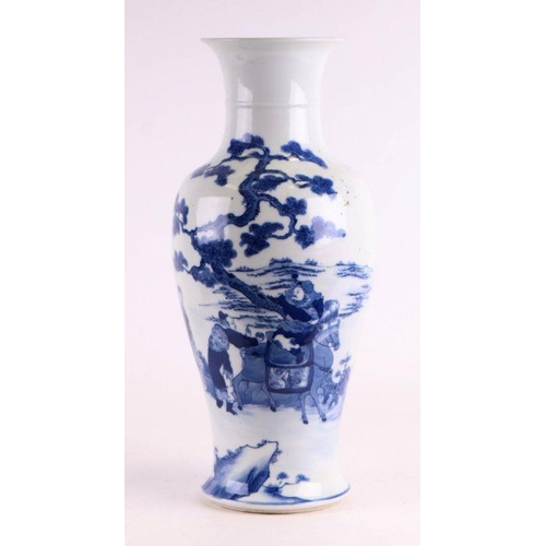 891 - A large Chinese blue and white baluster vase decorated with figures in a landscape, 46cm high.