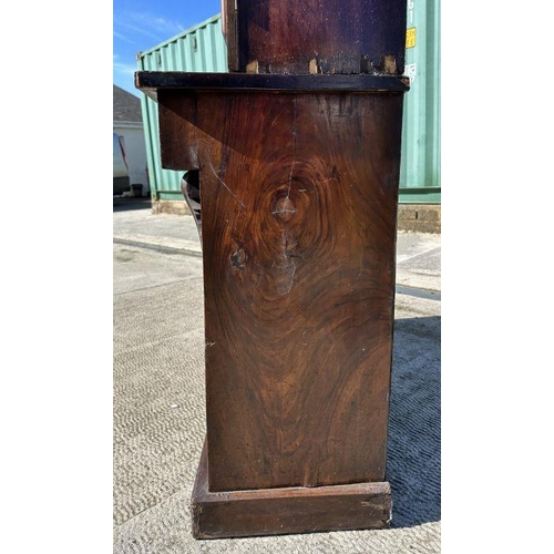 910 - A Victorian bookcase on cupboard, the pair of glazed doors enclosing a shelved interior with cupboar... 