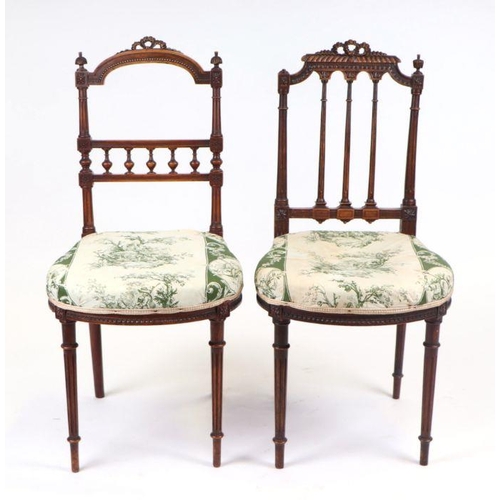 917 - A pair of 19th century mahogany bedroom chairs with upholstered seats, on turned reeded front suppor... 