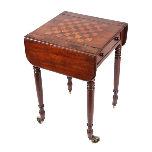 921 - A Victorian mahogany drop-flap games table with chess board top, on turned legs, 48cm wide.