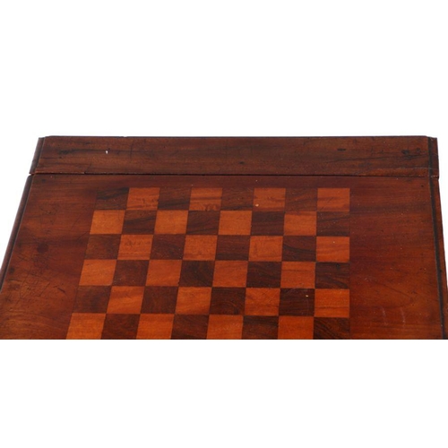 921 - A Victorian mahogany drop-flap games table with chess board top, on turned legs, 48cm wide.