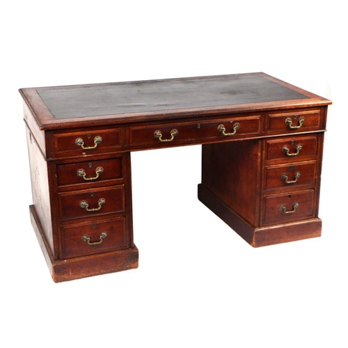 924 - A late 19th century mahogany pedestal desk with an arrangement of nine drawers, on a plinth base, 13... 