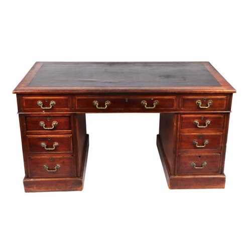 924 - A late 19th century mahogany pedestal desk with an arrangement of nine drawers, on a plinth base, 13... 