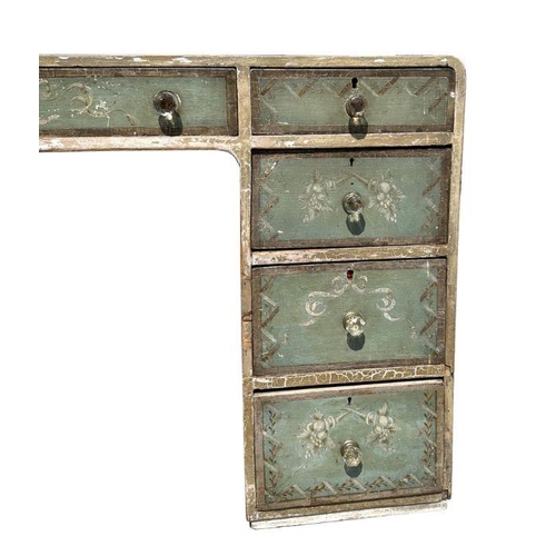 926 - An early 20th century painted pine desk or dressing chest with an arrangement of nine drawers, with ... 