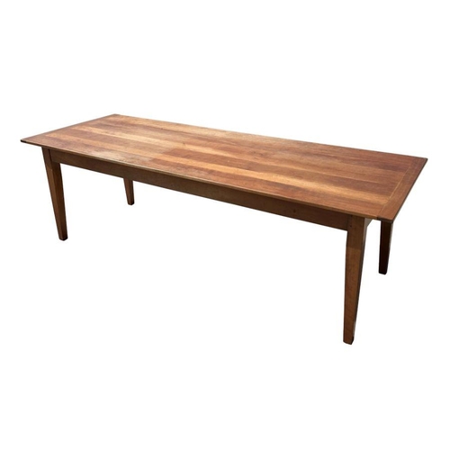 927 - A French cherrywood farmhouse table, the rectangular on tapering square legs, 86cm by 240cm long, wi... 