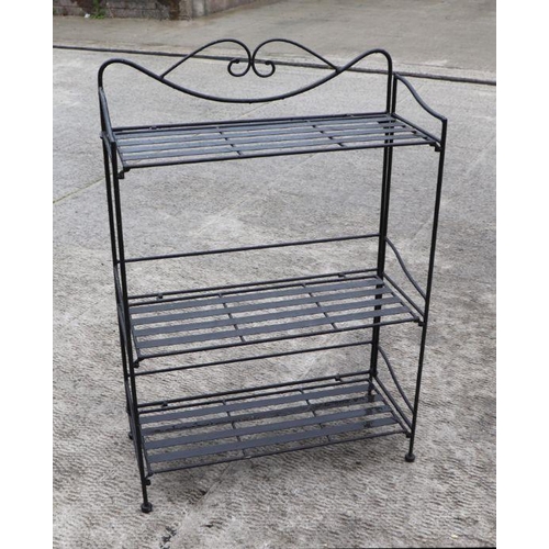 939 - A French three-fold metal wirework shelving unit, 70cms wide.